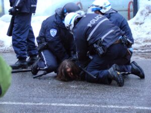 excessive force police hold man on ground