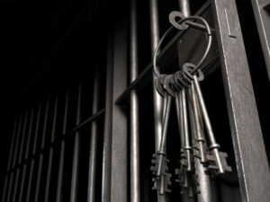 jail keys on ring in cell door silver black felony